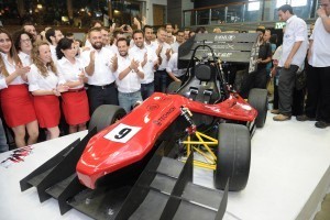 The team of students at the unveiling ceremony for the new Formula car