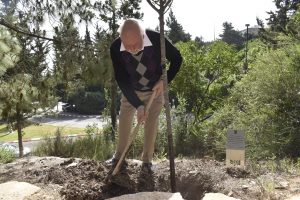 Sir Stoddart planting a tree on the Technion’s “Nobel Path”