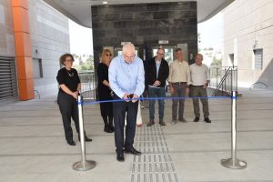 Technion President Prof. Uri Sivan cuts the ribbon at the inauguration of Cypress Towers