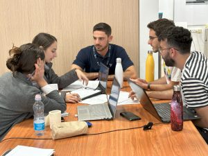 Ohad Schindler (center) with several of the participants