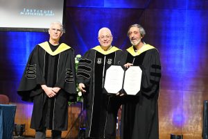 Prof. Uri Sivan (middle) and Dean of the Graduate School Prof. Uri Peskin (left) conferring the degree on Prof. Avi Wigderson