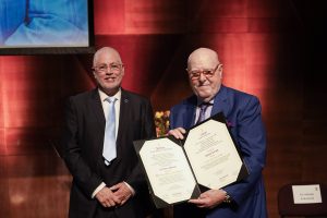 Avraham Ashkenazi receiving the honorary fellowship from President Uri Sivan