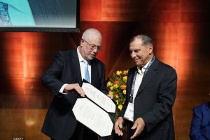 Avraham Ashkenazi receiving the honorary fellowship from President Uri Sivan