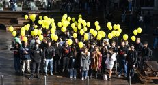Students with yellow balloons