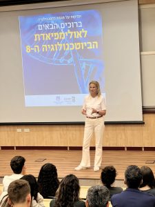 Prof. Ester Segal congratulates the students