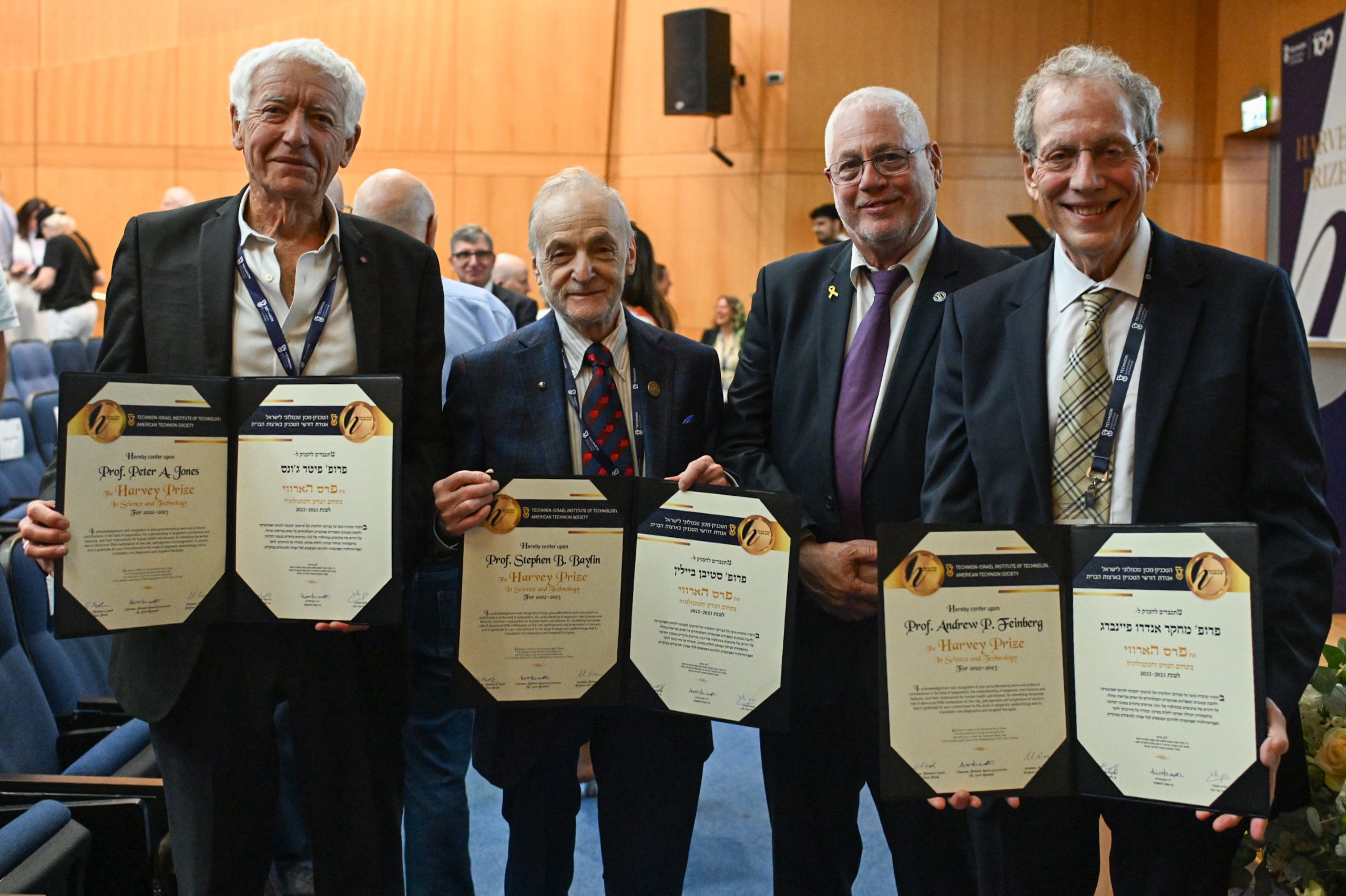 מימין לשמאל: פרופ' אנדרו פיינברג, פרופ' אורי סיון, פרופ' סטיבן ביילין ופרופ' פיטר ג'ונס